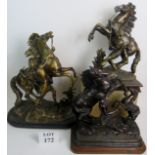 Three late 19th/early 20th century and later bronzed cast metal models of the `Marley Horse` groups,