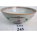 An 18th century Chinese porcelain bowl, of steep sided circular form terminating on a foot,