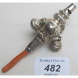 A silver rattle/whistle with coral handle, Birmingham 1890.