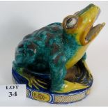 A large Spanish Faience pottery model of a frog with polychrome decoration, Triana (Seville),