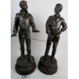 A pair of vintage French bronzed spelter statuettes cast as gentlemen swordsmen,