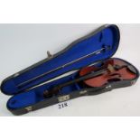 A 19th/early 20th century French violin, labelled "DULCIS ET FORTIS", 36cm, with bow and case (a/f).