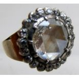 A 3ct diamond ring, possibly 19th century, surrounded with 20 diamonds in later setting,