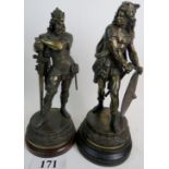 A pair of vintage period-style bronzed figures cast as ancient warriors, on wooden plinth bases,