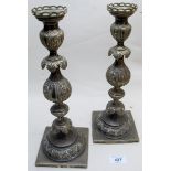 A pair of Russian 84 candlesticks, marked T.