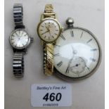 A silver cased pocket watch and two ladies Omega wristwatches,