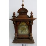 A Junghans walnut cased striking mantel clock of architectural form, c1900,