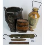 A collection of vintage rustic bygones including a coopered barrel form bucket,