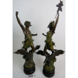 A pair of vintage French patinated and bronzed spelter figures cast as classical Gods on Eagles,