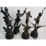 Two pairs of French bronzed spelter sculptural figures, c1900, raised on wooden plinth bases,