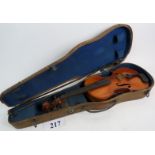 A 19th/early 20th century French violin, labelled "COMPAGNON", 33cm, with bow and case (a/f).