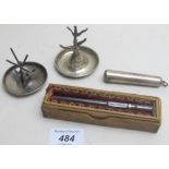 2 silver ring trees, a silver cased thermometer and a silver cased cigar holder, all hallmarked.