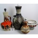 A collection of mid century ceramic lamp bases, fat lava style,