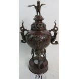 A late 19th/early 20th century Japanese bronze incense burner and cover,