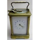 A brass carriage clock,