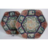 A pair of 19th century Imari porcelain dishes of lobbed hexagonal form, painted with dragons,