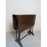 An Edwardian mahogany Sutherland table i