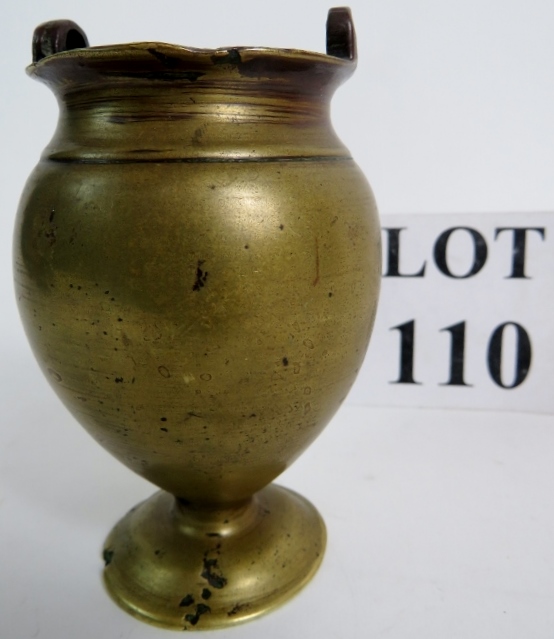 An antique Chinese bronze urn form vase, of archaic form and likely of period, 11cm high.