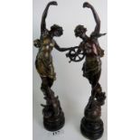 A pair of French bronzed spelter figures