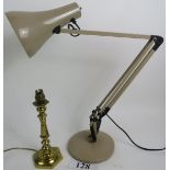 A vintage angle-poise lamp, and a period