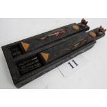 An Asian chopstick set, comprising a carved wooden box in the Aesthetic movement taste,