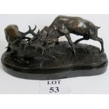 A contemporary bronze statue of rutting stags on marble plinth, 16" wide, signed,