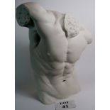 A contemporary simulated large carved marble torso of an athletic male, approx 20" tall,