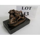 Small modern Japanese erotic statue of a supine couple, bronzed on a marble base, 10cm wide,