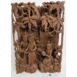 An Asian carved wooden panel,