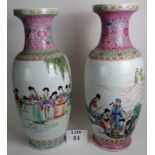 A near pair of large Chinese vases, decorated in the famille rose palette,