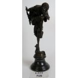 A contemporary Art Deco style bronze statue of dancing girl with serpent at her feet,