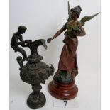 A French bronze figure titled 'Bienfaisance', c1900, and a similar period bronze ancient-style ewer,