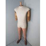 A mid 20th century shop's mannequin, wit