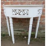 A small 20th Century white painted demi-