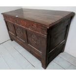 An 18th century oak carved mule chest, w