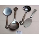 Four Danish white metal serving spoons w