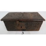 A 17th century English carved oak box, dated `1683', and initialled `E' and `P`, with hinged lid,