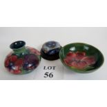 Moorcroft footed bowl, squat vase and a paperweight, all decorated with bright enamels, bowl 5.