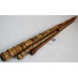 Two antique bamboo canes and a vintage leather riding crop (a/f),