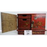 A modern Chinese red lacquer and Chinoiserie decorated table-top cabinet,
