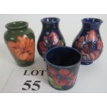 Three Moorcroft small vases and a tumbler, with floral decoration,