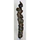 A Tanzanian Makonde carved hardwood `Tree of Life' statuette, probably ebony,