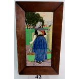 A late 19th / early 20th century Dutch painted porcelain plaque depicting a girl carrying pails in