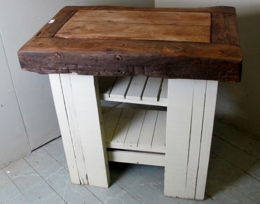 A cool 19th century butchers block on later painted base with planked shelves est: £100-£200