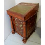 A Victorian pale mahogany Davenport desk with a brass galleried rail over a green tooled leather