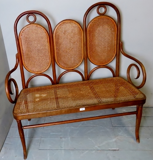 A fine early 20th century bent-wood bergere two seater hall seat,