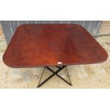 A 19th century mahogany table top with reeded edge over later metal folding base,