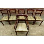 A Regency set of 6 mahogany dining chairs with upholstered seats to include one carver,