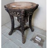 An early 20th century Chinese carved jardiniere stand with inset marble top est: £30-£50