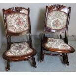 A pair of Edwardian folding steamer chairs,